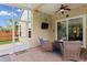 Screened-in patio with outdoor seating area at 14612 Corkwood Dr, Tampa, FL 33626