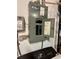 Close-up of an electrical panel next to the top of a washing machine at 1462 Highfield Dr, Clearwater, FL 33764