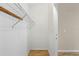 White wire shelving inside walk-in closet offers plenty of room for storage at 1569 Larkin Rd, Spring Hill, FL 34608