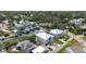 Aerial view of waterfront homes featuring boat docks surrounded by other homes in a neighborhood at 216 High St, Tarpon Springs, FL 34689