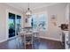 Breakfast nook with a table, chairs, and slider view of outdoor area at 216 High St, Tarpon Springs, FL 34689