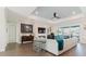 Comfortable living room with large windows and access to an outdoor patio at 216 High St, Tarpon Springs, FL 34689