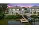 Beautiful waterfront home with a private dock, boat lift, and scenic water views at 216 High St, Tarpon Springs, FL 34689
