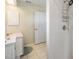 Tiled bathroom featuring a sink, vanity, and a tiled stand up shower at 2216 Eagle Bluff Dr, Valrico, FL 33596