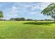 Sprawling green golf course provides an expansive outdoor setting to view mature trees at 2216 Eagle Bluff Dr, Valrico, FL 33596