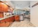 Charming kitchen with granite counters, stainless steel appliances and an open floor plan to the living room at 2216 Eagle Bluff Dr, Valrico, FL 33596