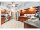 Spacious kitchen featuring granite countertops, ample cabinet space, and stainless steel appliances at 2216 Eagle Bluff Dr, Valrico, FL 33596