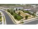 An aerial view of the park area featuring a turf area for yard games at 2401 Morninglight Dr, Lutz, FL 33558