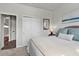 Cozy bedroom featuring a comfortable bed, ample natural light, and neutral decor at 2401 Morninglight Dr, Lutz, FL 33558