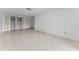 Spacious bedroom with large closet space and neutral tile flooring at 2700 Bayshore Blvd # 2110, Dunedin, FL 34698
