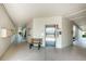 Hallway with neutral paint, lighting, elevator, bench and community mailboxes at 2700 Bayshore Blvd # 2110, Dunedin, FL 34698