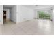 Inviting living room featuring tile flooring and balcony at 2700 Bayshore Blvd # 2110, Dunedin, FL 34698