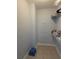 A standard walk-in closet with wire shelving and neutral paint at 2713 Via Murano # 210, Clearwater, FL 33764
