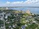 Stunning aerial shot showcasing a neighborhood with skyline views of coastal city at 3011 Harbor View, Tampa, FL 33611