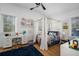 Comfortable bedroom with natural light, desk, and charming decor at 3011 Harbor View, Tampa, FL 33611