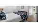 Bright bedroom featuring wood floors and two large windows at 3011 Harbor View, Tampa, FL 33611
