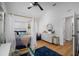 Bright bedroom featuring wood floors, white walls, canopy bed, and stylish furnishings at 3011 Harbor View, Tampa, FL 33611
