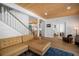 Spacious living area with wood floors and views of the kitchen and secondary living space at 3011 Harbor View, Tampa, FL 33611