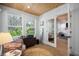 Comfortable home office with ample natural light, wood accents, and convenient access to the living areas at 3011 Harbor View, Tampa, FL 33611