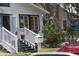 Charming boutique storefront with black and white painted stairs and an inviting entrance at 3205 Coventry N, Safety Harbor, FL 34695
