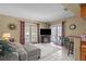Open living room with tiled floor, and french doors to the backyard at 3205 Coventry N, Safety Harbor, FL 34695