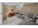 Inviting living room with a large sectional sofa and adjacent dining area at 3205 Coventry N, Safety Harbor, FL 34695