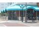 Exterior restaurant with large windows and an awning, perfect for enjoying a meal outside at 3205 Coventry N, Safety Harbor, FL 34695