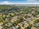 High aerial image of the neighborhood with lush trees and a location pin at 3310 W Ballast Point Blvd, Tampa, FL 33611