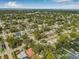 Aerial view of the neighborhood with lush greenery and a location pin at 3310 W Ballast Point Blvd, Tampa, FL 33611