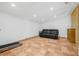 Bright living room featuring tile floors and a leather couch at 3310 W Ballast Point Blvd, Tampa, FL 33611