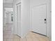 Bright foyer featuring tile flooring and a closet for storage at 3447 Killdeer Pl, Palm Harbor, FL 34685