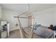 Bedroom features a twin bed and unique hammock chair at 3739 Capri Coast Dr, Plant City, FL 33565