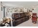 Open concept living space with tile floors flows into the kitchen area at 3739 Capri Coast Dr, Plant City, FL 33565