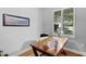 Bright home office with hardwood floors, a large window, and an office desk at 3809 W San Pedro St, Tampa, FL 33629