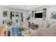 Comfortable living room showcasing a built-in entertainment center and stylish decor at 3809 W San Pedro St, Tampa, FL 33629
