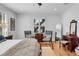 Bright main bedroom featuring hardwood floors, ceiling fan, and plenty of natural light at 3809 W San Pedro St, Tampa, FL 33629