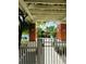 Inviting pool area entrance with lush landscaping and serene ambiance, offering a relaxing retreat at 4207 S Dale Mabry Hwy # 9106, Tampa, FL 33611