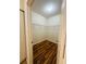 Walk-in closet with wire shelving, laminate flooring and good storage space at 4207 S Dale Mabry Hwy # 9106, Tampa, FL 33611