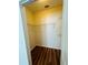 Empty walk-in closet with laminate floors and built-in shelving ready for your personal touches at 4207 S Dale Mabry Hwy # 9106, Tampa, FL 33611