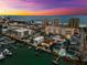 Scenic aerial view capturing waterfront condos, city skyline, and the marina at 479 E Shore Dr # 5, Clearwater, FL 33767