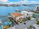 An aerial view of the neighborhood from the street, marina, and water at 479 E Shore Dr # 5, Clearwater, FL 33767
