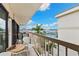 A serene, spacious balcony features calming views of the marina and waterfront skyline at 479 E Shore Dr # 5, Clearwater, FL 33767