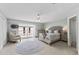 A modern bedroom offers comfortable seating, balcony access, and bright natural lighting at 479 E Shore Dr # 5, Clearwater, FL 33767