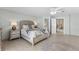 Spacious bedroom offers a walk in and ensuite bathroom with a modern vanity and ample lighting at 479 E Shore Dr # 5, Clearwater, FL 33767