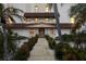 Inviting building entrance with well-maintained landscaping enhancing curb appeal at 479 E Shore Dr # 5, Clearwater, FL 33767
