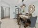 Comfortable dining room with a large dining table and stylish decor at 479 E Shore Dr # 5, Clearwater, FL 33767
