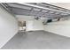 Spacious garage with laundry hookups and ample storage shelving at 479 E Shore Dr # 5, Clearwater, FL 33767