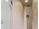 Modern tiled shower with rainfall showerhead and sleek glass door at 479 E Shore Dr # 5, Clearwater, FL 33767