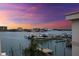Stunning waterfront view with boats docked, enhancing the coastal living experience at 479 E Shore Dr # 5, Clearwater, FL 33767