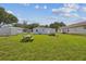 Spacious backyard features a picnic table and plenty of green space at 4802 18Th St, Zephyrhills, FL 33542